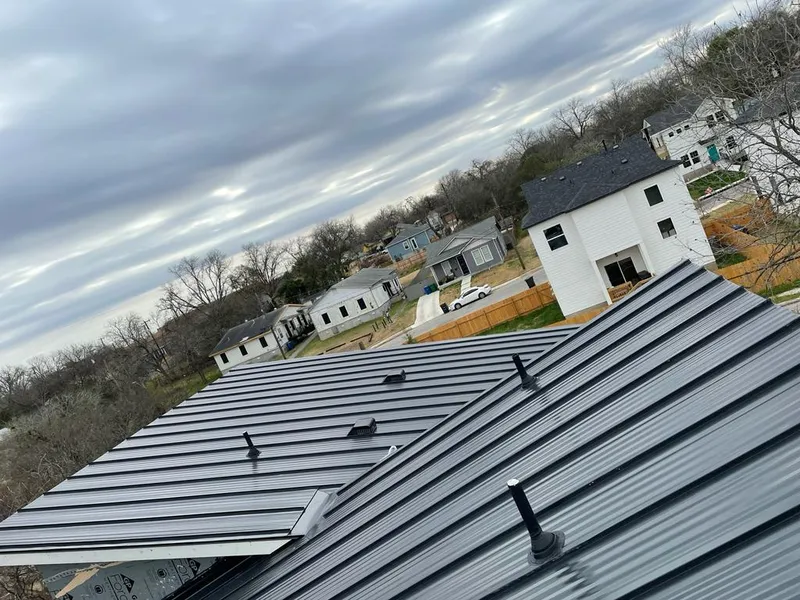 Standing seam metal roof panels with vents for Skylight Repair in Silver City